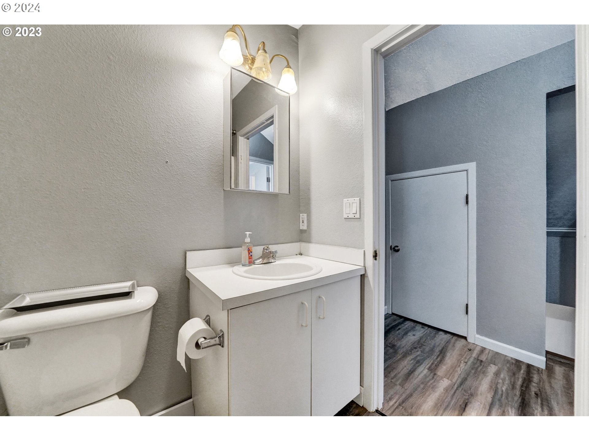 12638 Southeast Foster Road, Unit 12 Portland, OR 97236 - Photo 24 of 32 a bathroom with a sink and a toilet