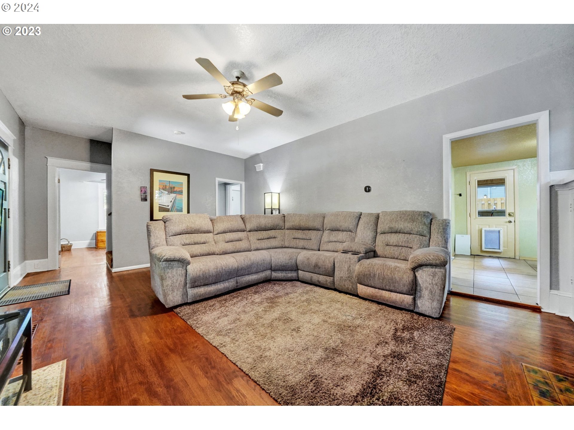 12638 Southeast Foster Road, Unit 12 Portland, OR 97236 - Photo 5 of 32 a living room with furniture and a wooden floor