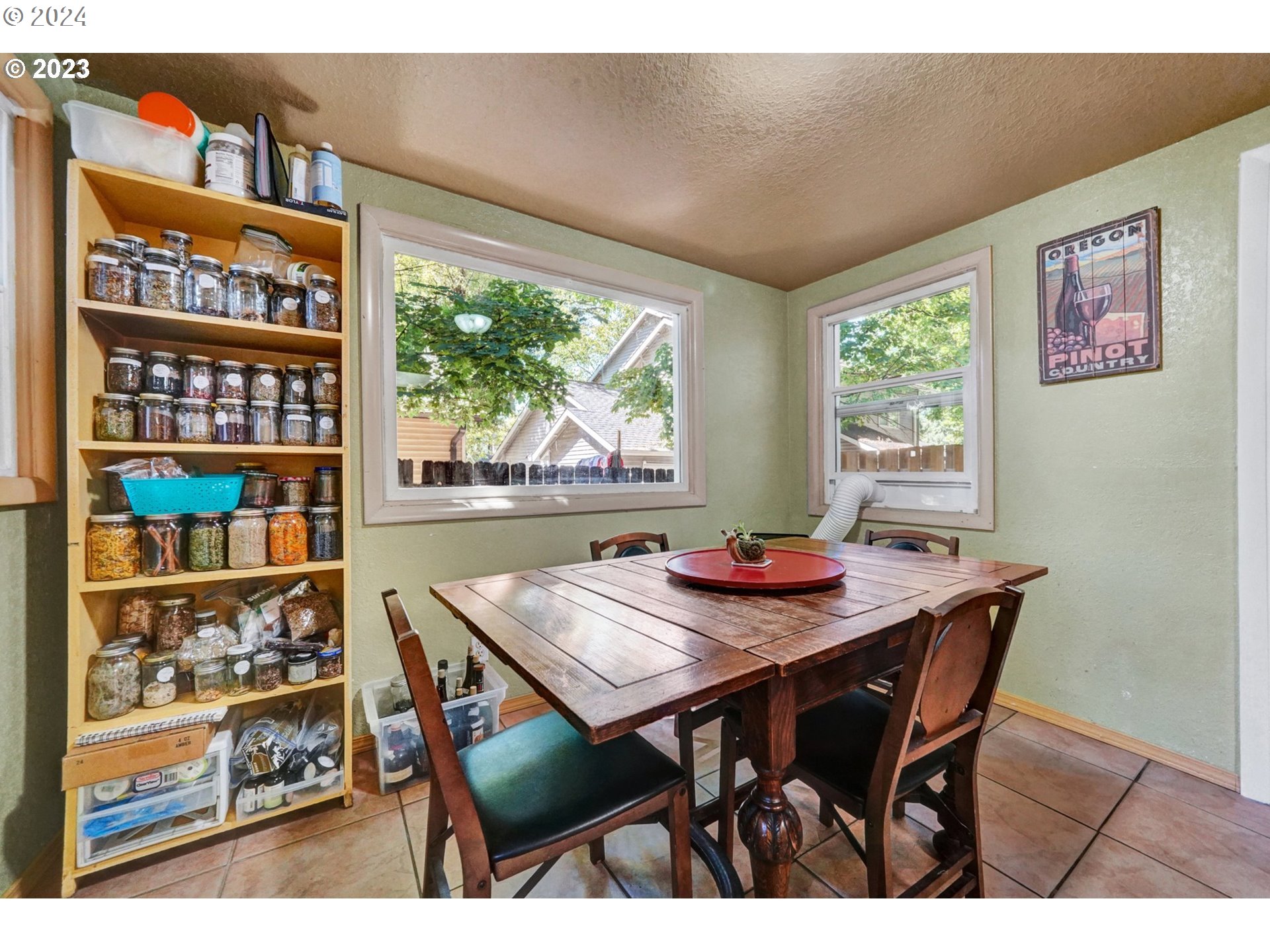 12638 Southeast Foster Road, Unit 12 Portland, OR 97236 - Photo 7 of 32 a view of a dining room with furniture window and outside view