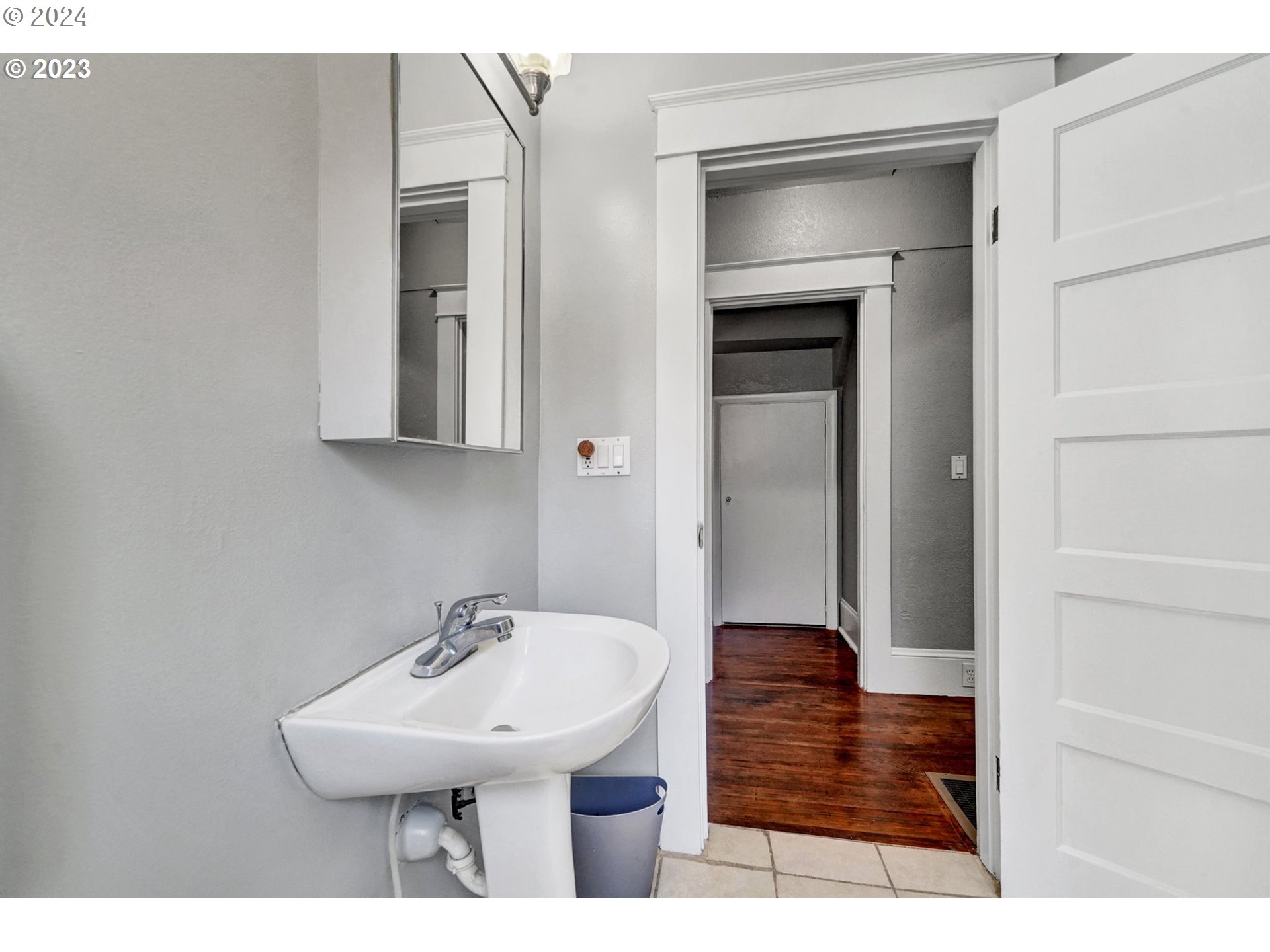 12638 Southeast Foster Road, Unit 12 Portland, OR 97236 - Photo 9 of 32 a bathroom with a sink and a mirror