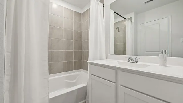 a bathroom with a sink and a bathtub