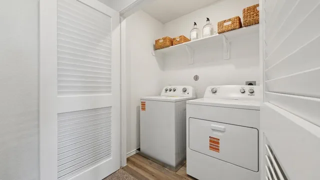 a utility room with dryer and washer