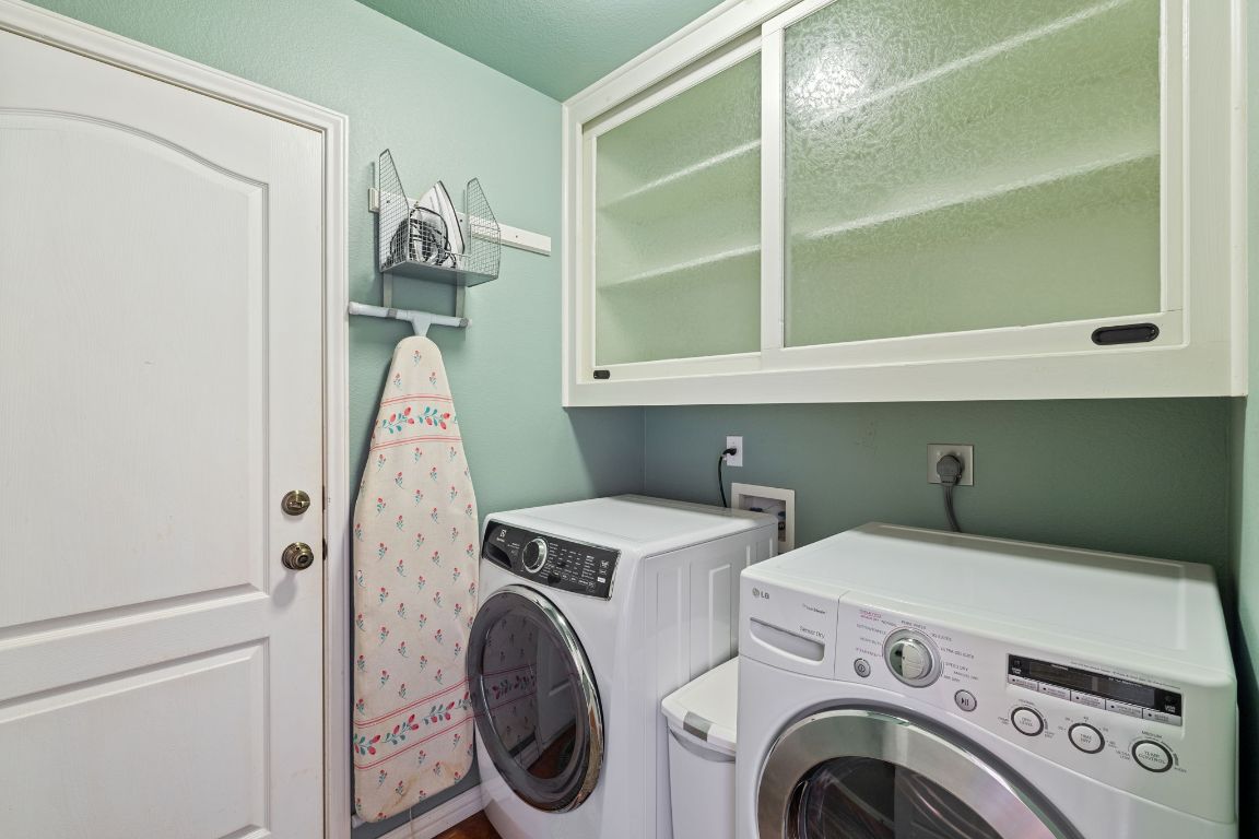 2114 Desco Drive Austin, TX 78748 - Photo 16 of 40 Washroom with independent washer and dryer