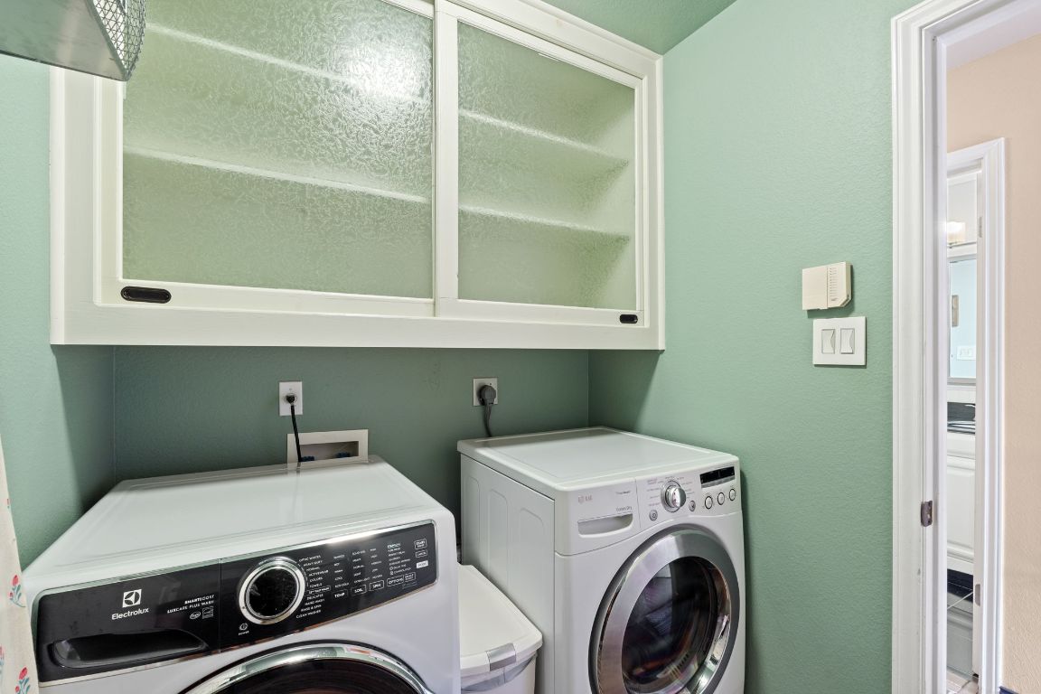 2114 Desco Drive Austin, TX 78748 - Photo 17 of 40 Laundry area featuring washer and dryer