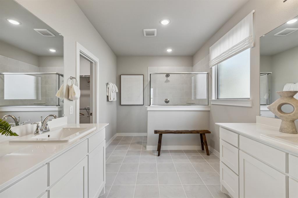 1129 Del Rio Drive Lavon, TX 75166 - Photo 18 of 28 Primary bathroom in the Wimbledon home plan by Trophy Signature Homes – REPRESENTATIVE PHOTO