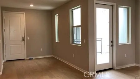 an empty room with windows