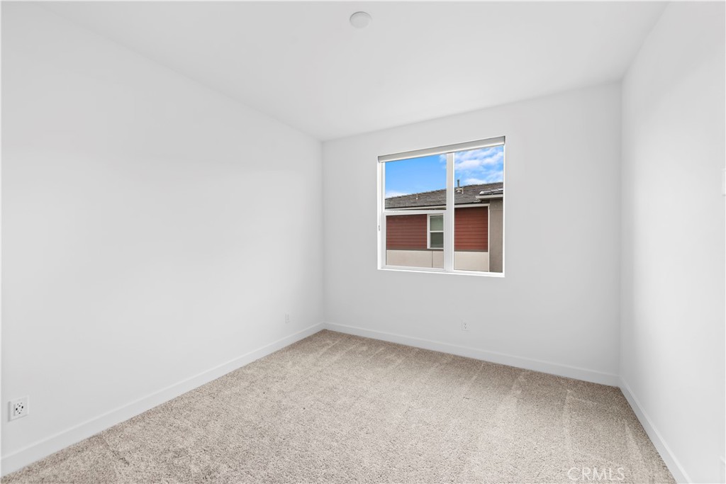 235 Carmona Lake Forest, CA 92630 - Photo 12 of 21 an empty room with a window