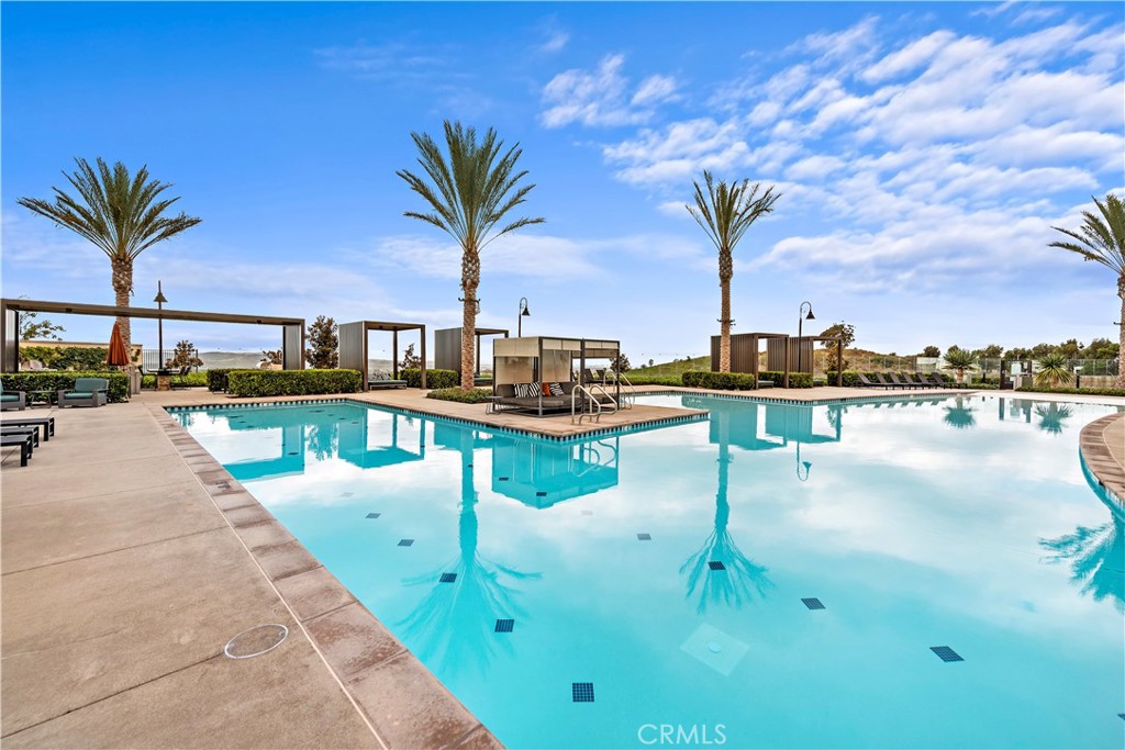 235 Carmona Lake Forest, CA 92630 - Photo 15 of 21 a swimming pool view with a lake view