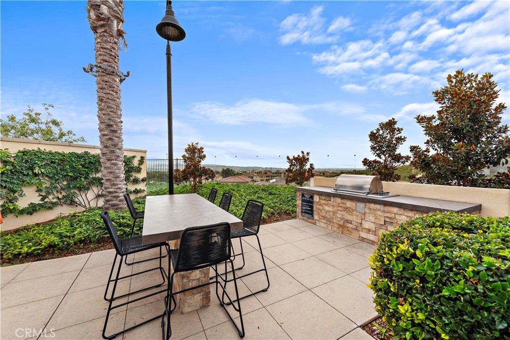 235 Carmona Lake Forest, CA 92630 - Photo 17 of 21 a view of a terrace with sitting area