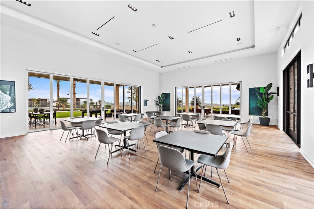 235 Carmona Lake Forest, CA 92630 - Photo 19 of 21 a living room with lots of furniture and a wooden floor