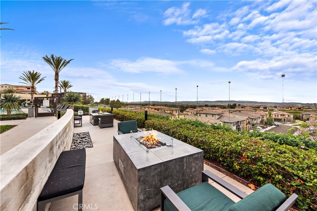 235 Carmona Lake Forest, CA 92630 - Photo 21 of 21 a view of a roof deck with potted plants