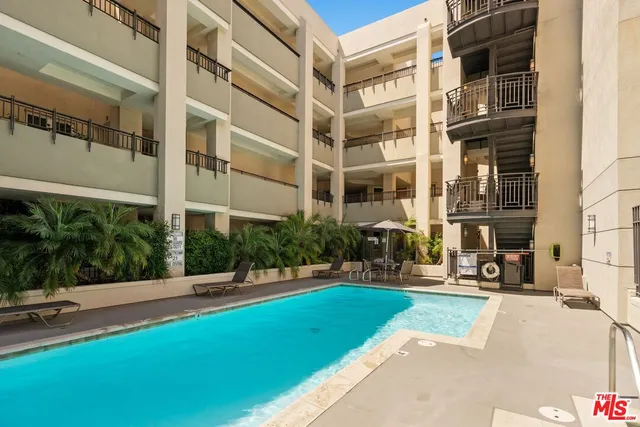 a view of a building with a yard