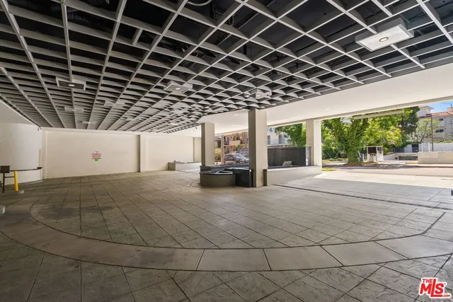 a view of a garage with wooden floor