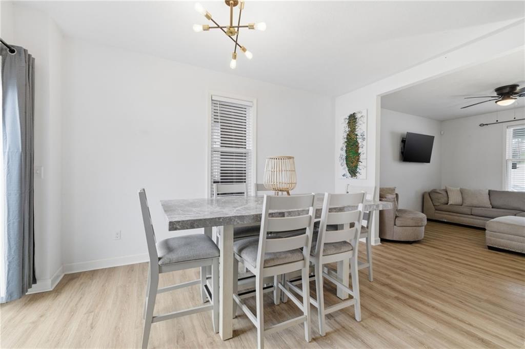 1535 Vance Avenue Coraopolis, PA 15108 - Photo 13 of 38 a view of a dining room with furniture window and wooden floor
