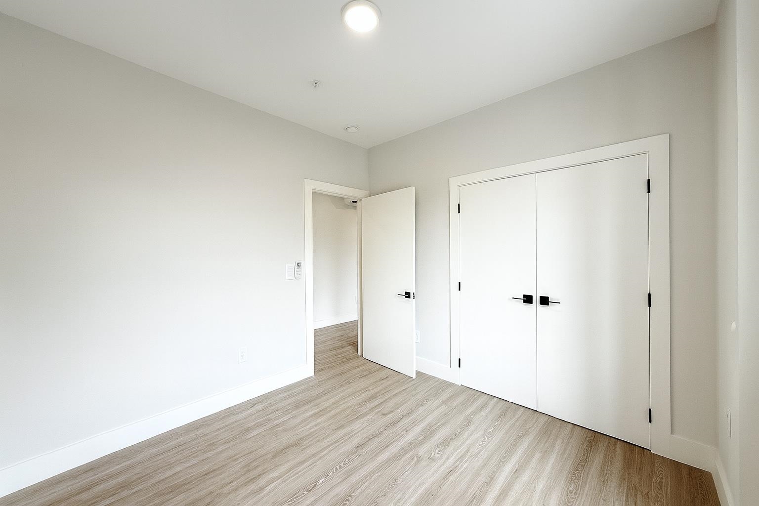 103 Bostwick Avenue, Unit 3A Jersey City, NJ 07305 - Photo 6 of 18 a view of an empty room