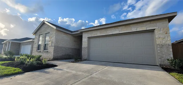 a view of a lake with houses in the back