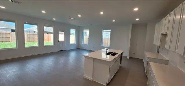 a view of a sign board with yard