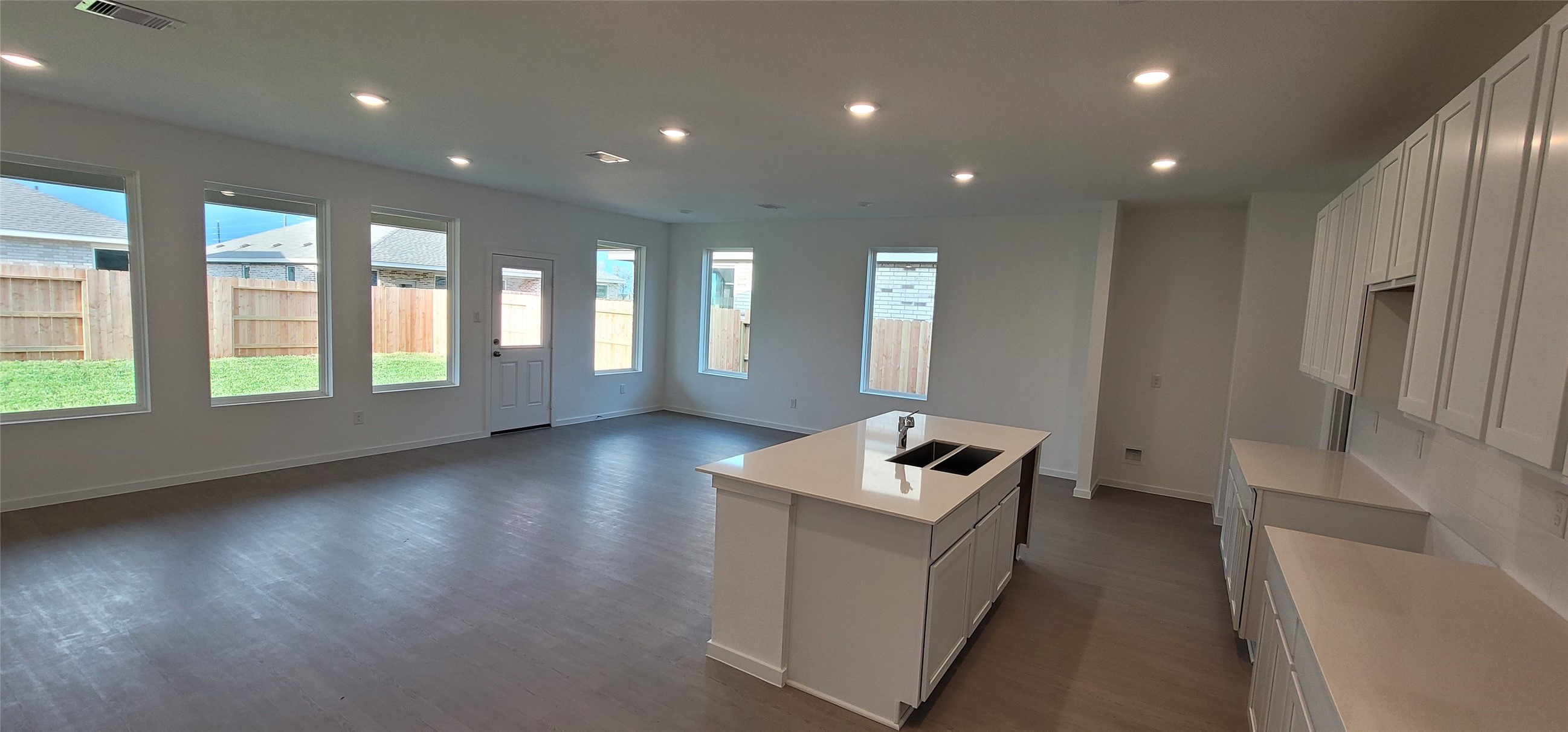 10615 Summers Way Beasley, TX 77417 - Photo 14 of 19 a view of an empty room with wooden floor and a window