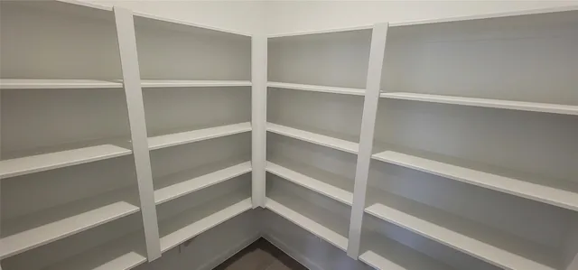 an aerial view of house with yard