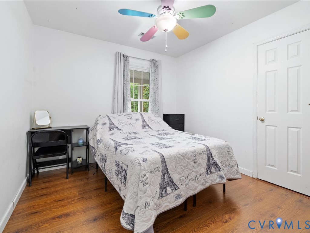 3695 Three Chopt Road Gum Spring, VA 23065 - Photo 23 of 55 Bedroom featuring wood-finish flooring, a multi-pa