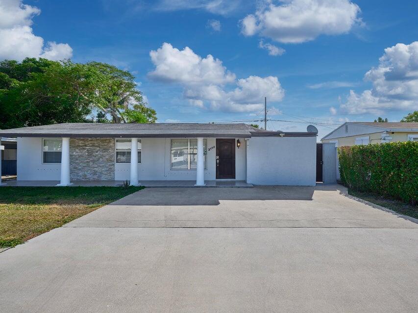 2112 Longwood Road West Palm Beach, FL 33409 - Photo 4 of 12 Front