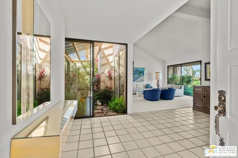 a view of a living room and furniture