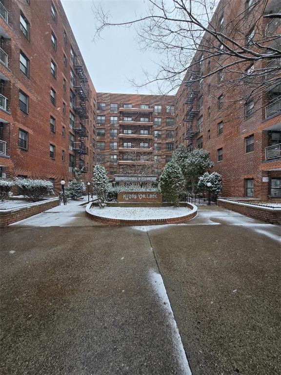 1199 East 53rd Street, Unit 2X Brooklyn, NY 11234 - Photo 2 of 2 a view of a street with a building in the background