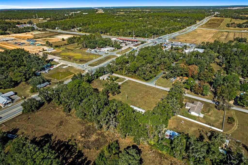 3228 West Laurel Street Lecanto, FL 34461 - Photo 13 of 21 an aerial view of residential houses with outdoor space and trees