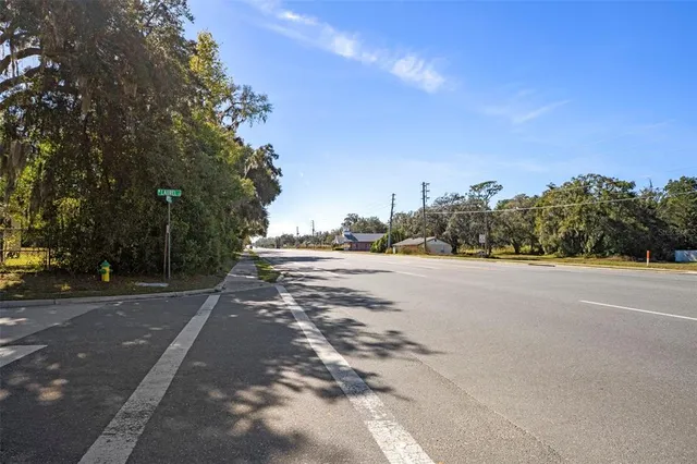 a view of a field with an ocean
