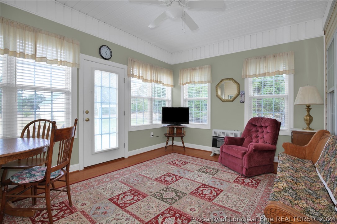 10703 Aberdeen Road Aberdeen, NC 28315 - Photo 16 of 33 a living room with furniture and a large window
