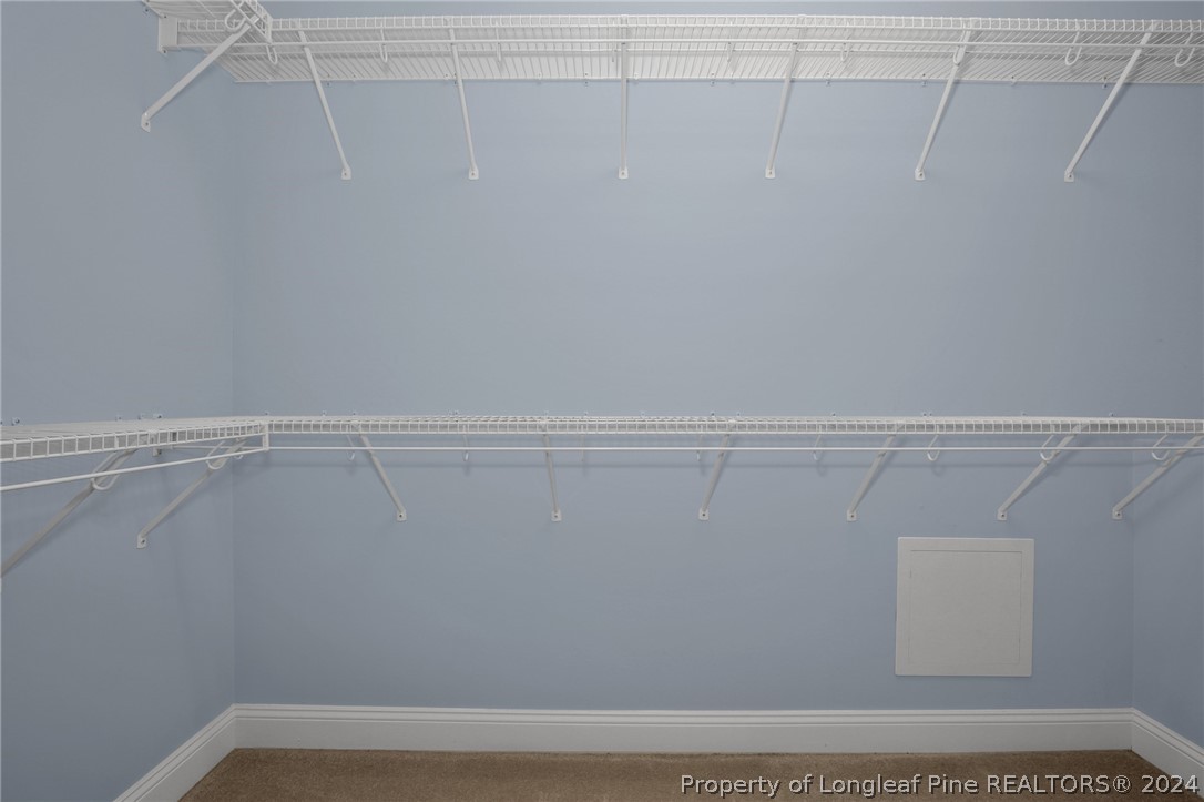10703 Aberdeen Road Aberdeen, NC 28315 - Photo 22 of 33 a view of a room with racks on the wall
