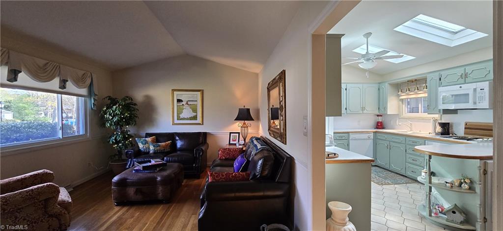 105 Mendenhall Road Jamestown, NC 27282 - Photo 10 of 42 Just enough privacy between living and kitchen