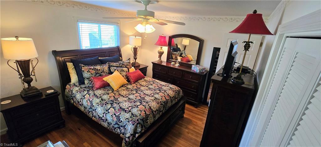 105 Mendenhall Road Jamestown, NC 27282 - Photo 12 of 42 Primary bedroom - beautiful wood floors