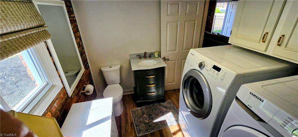 105 Mendenhall Road Jamestown, NC 27282 - Photo 20 of 42 Half bath and laundry combination in lower level