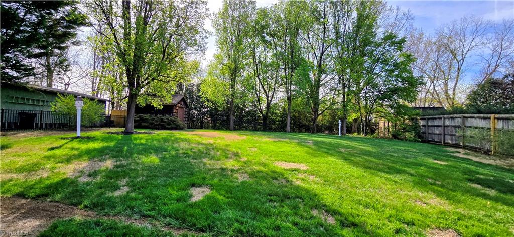 105 Mendenhall Road Jamestown, NC 27282 - Photo 27 of 42 Room to roam in this back with aluminum fencing