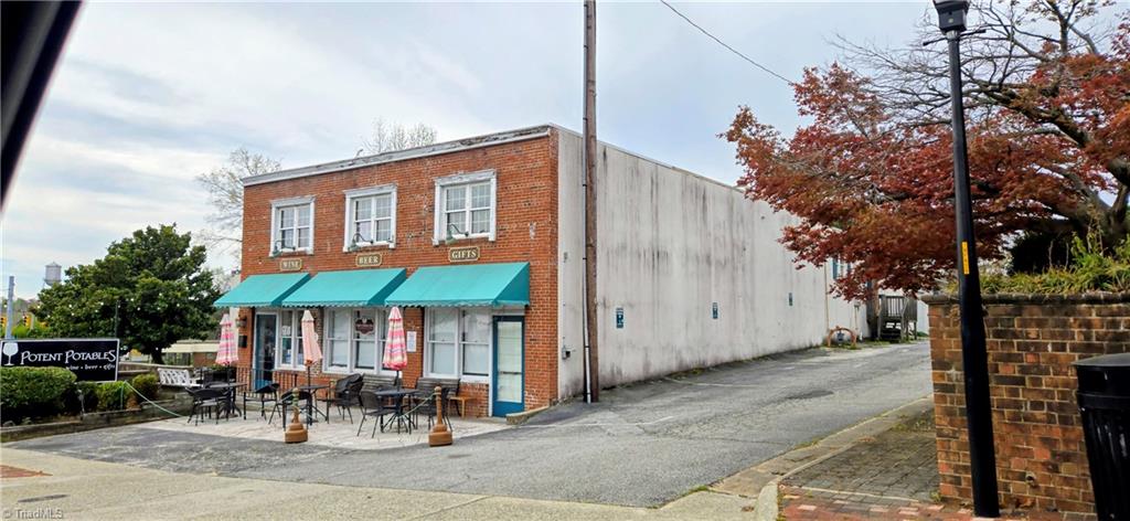 105 Mendenhall Road Jamestown, NC 27282 - Photo 34 of 42 Relax with friend at Potent Potables