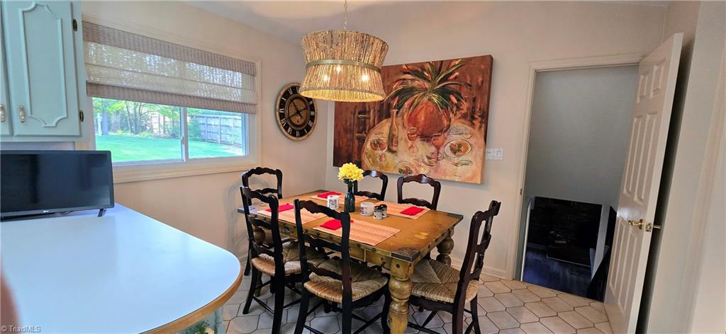 105 Mendenhall Road Jamestown, NC 27282 - Photo 7 of 42 Door to right leads to beautiful basement family room