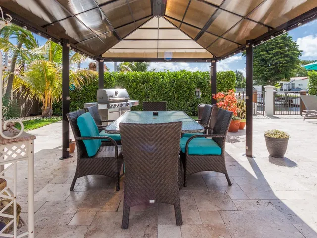swimming pool view with outdoor seating