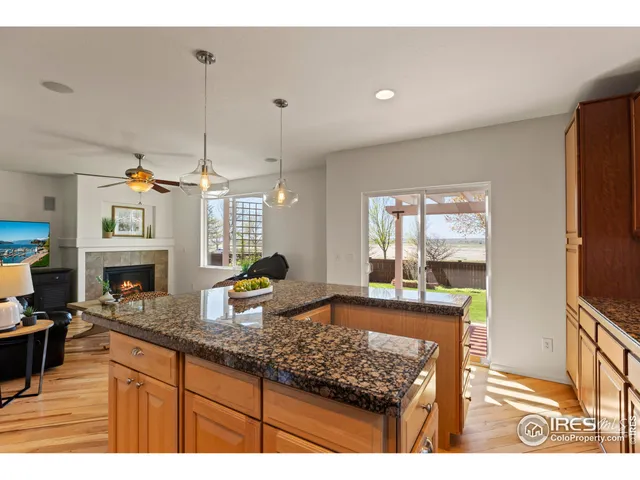 a very nice looking kitchen with a large window