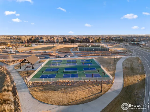 a front view of a house with a yard and porch