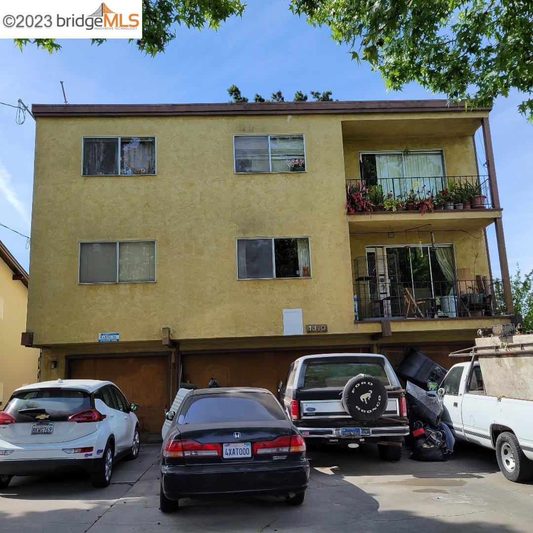 1310 Berkeley Way Berkeley, CA 94702 - Photo 1 of 1 a view of cars parked in front of a building