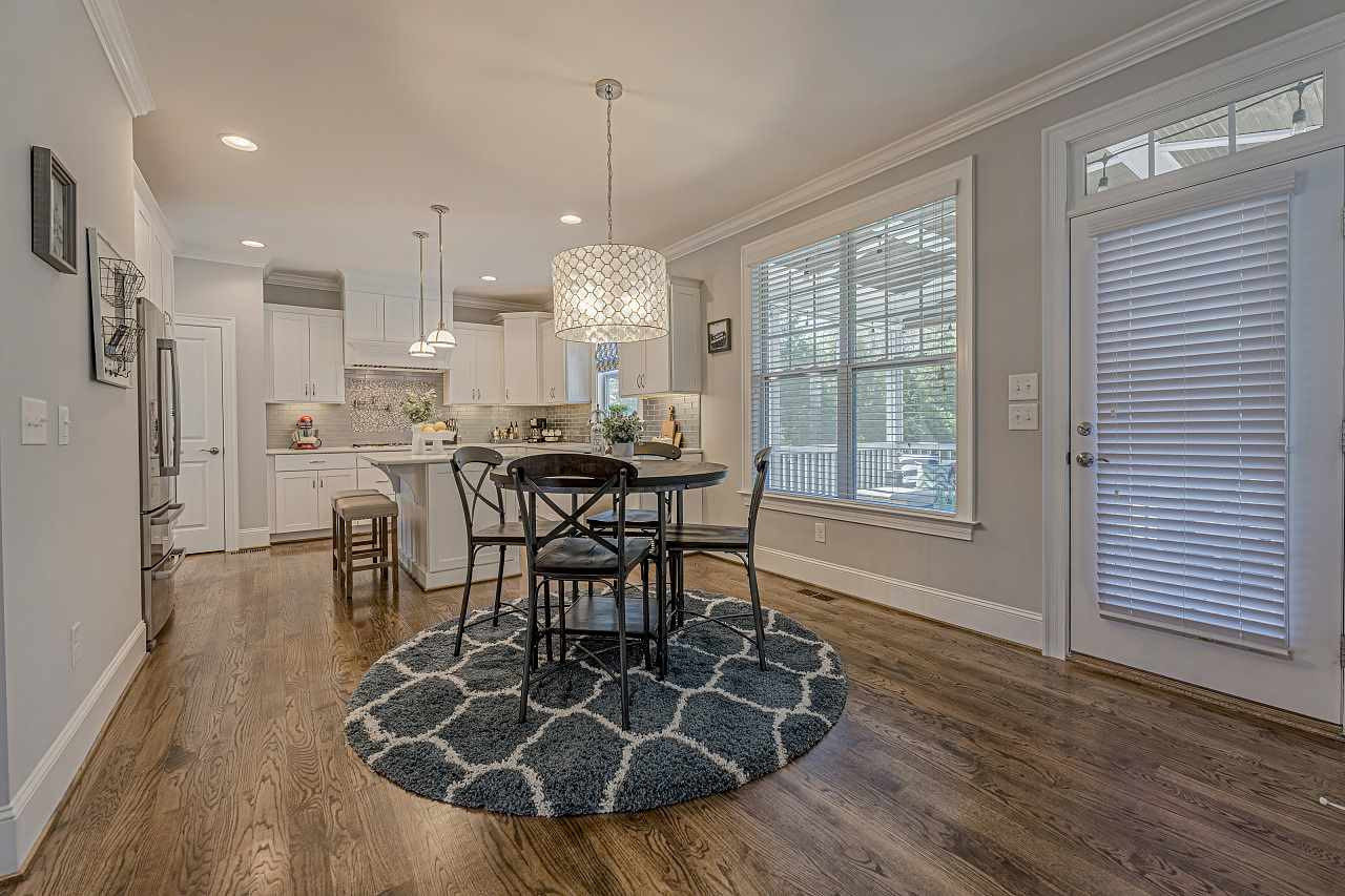 7605 Stonehenge Farm Lane Raleigh, NC 27613 - Photo 14 of 30 Kitchen nook overlooking luxurious kitchen Kitchen