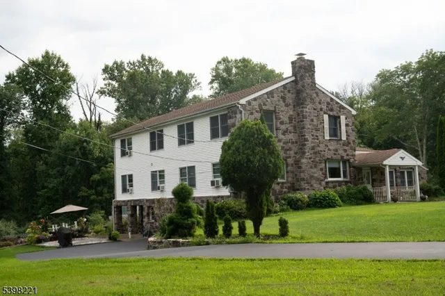 a house view with a garden space