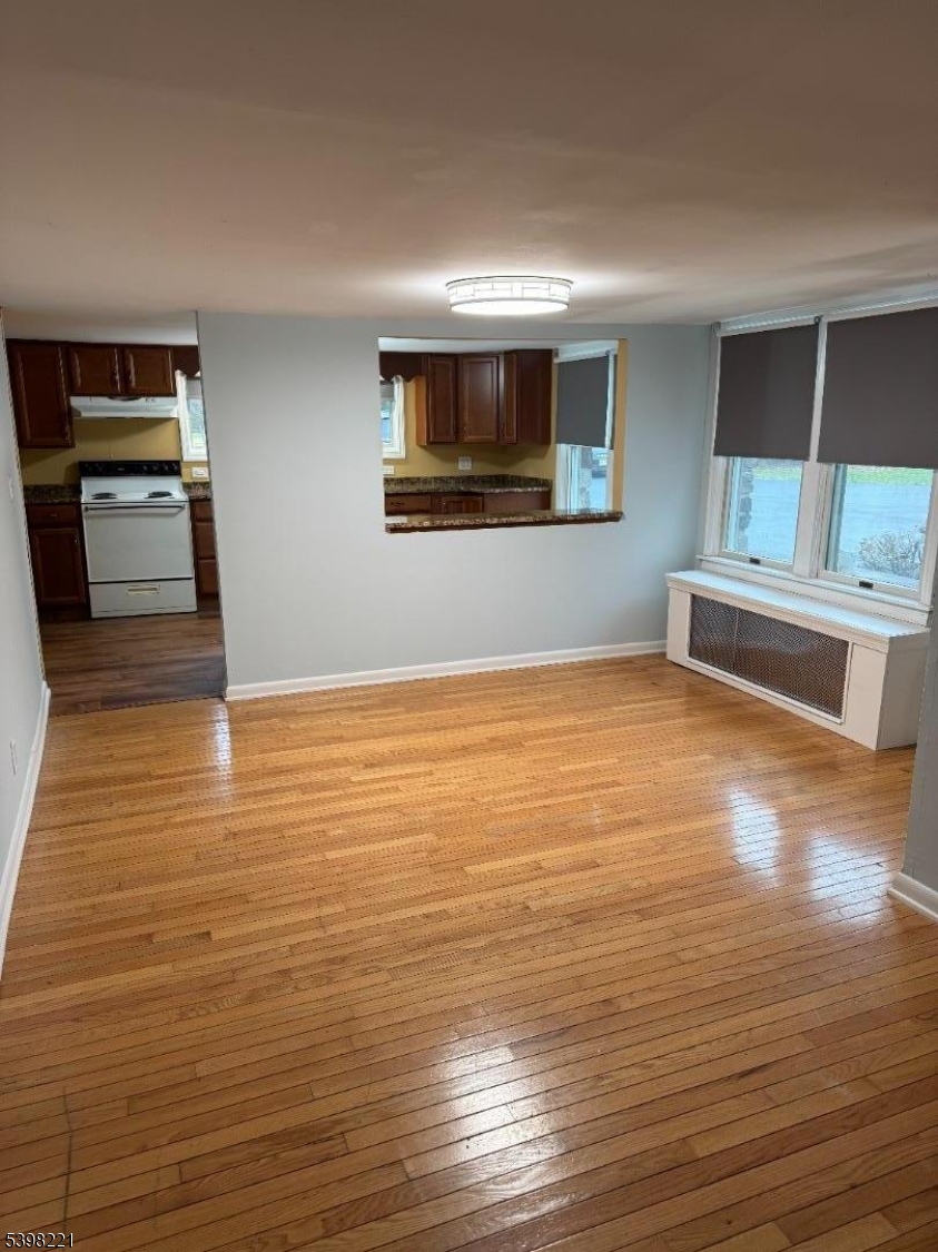 656 Highway 12, Unit 4 Flemington, NJ 08822 - Photo 4 of 16 a view of a livingroom with wooden floor