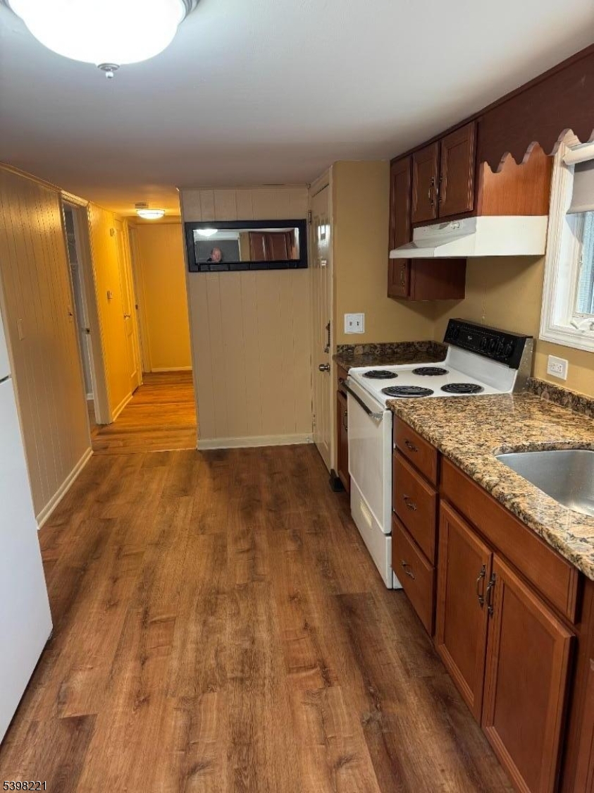 656 Highway 12, Unit 4 Flemington, NJ 08822 - Photo 9 of 16 a kitchen with granite countertop a stove and a sink