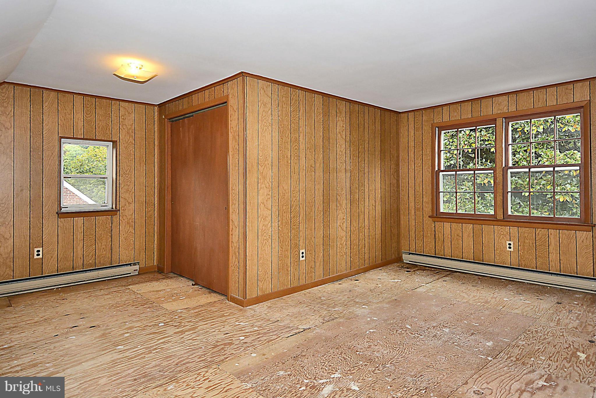 1111 Woodside Parkway Silver Spring, MD 20910 - Photo 26 of 30 wooden floor in an empty room with a window