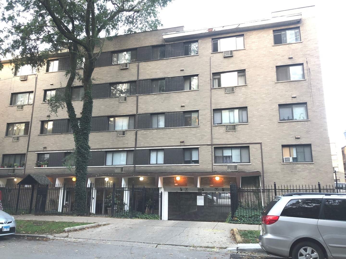 a view of a building and a street