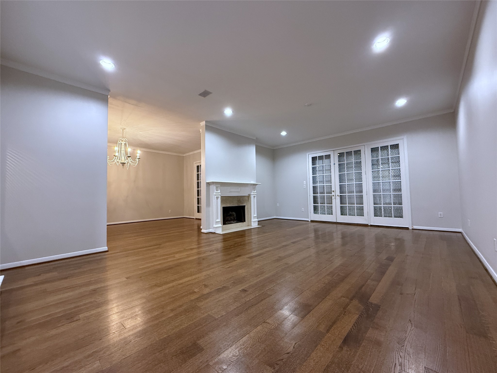 2813 Saint Street Houston, TX 77027 - Photo 14 of 39 The dining room & living room doors/windows are each equipped with motorized window shutters. In this picture, the shutters are closed.