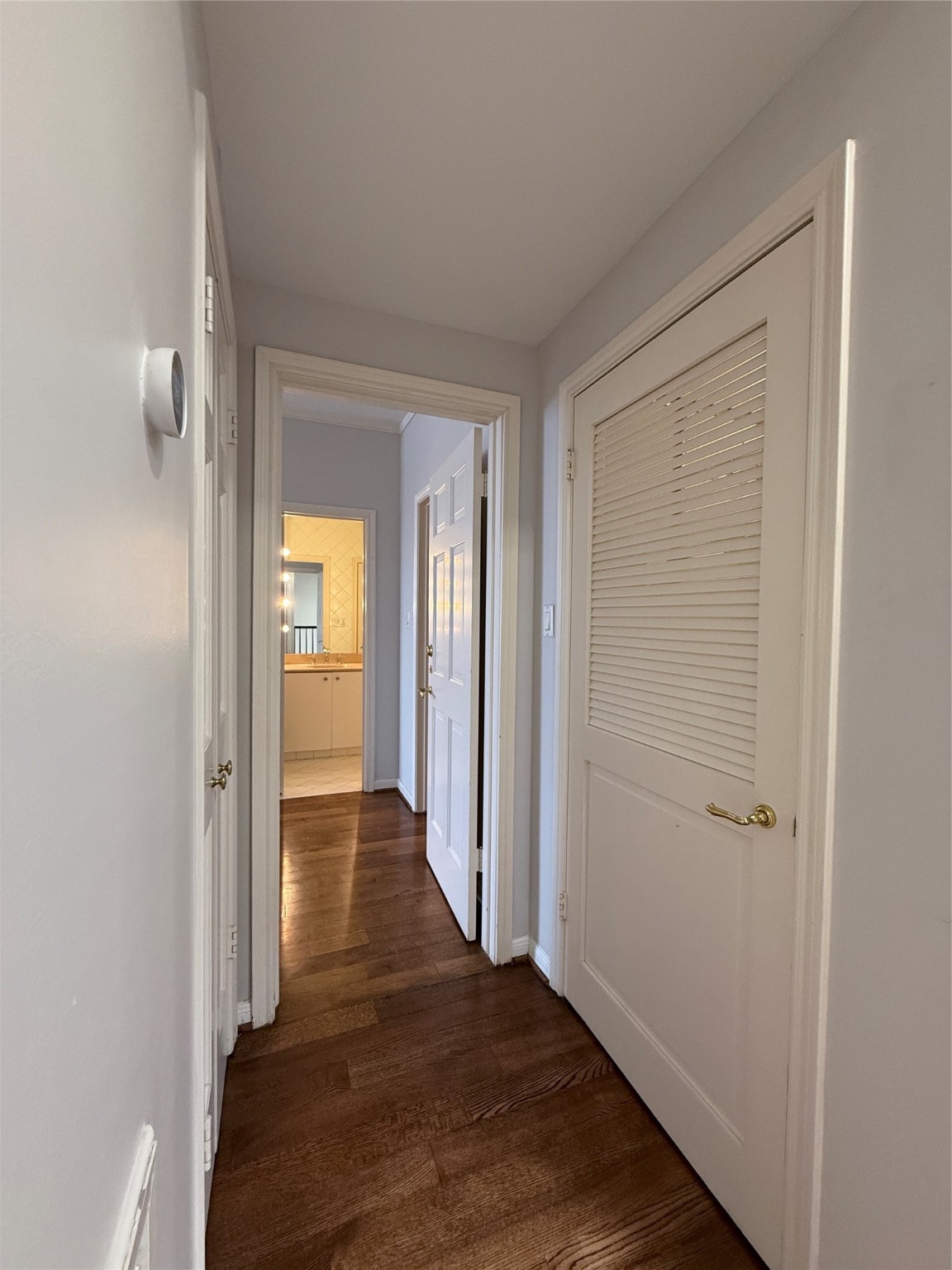 2813 Saint Street Houston, TX 77027 - Photo 34 of 39 In the hallway between the 1st & 2nd secondary bedrooms, on the left is a linin closet and on the right is the laudry rooom.