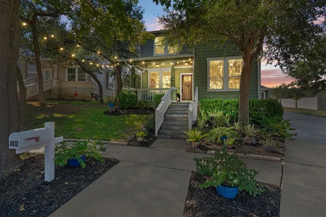 a view of a house with a garden